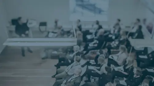 people listening to a conference